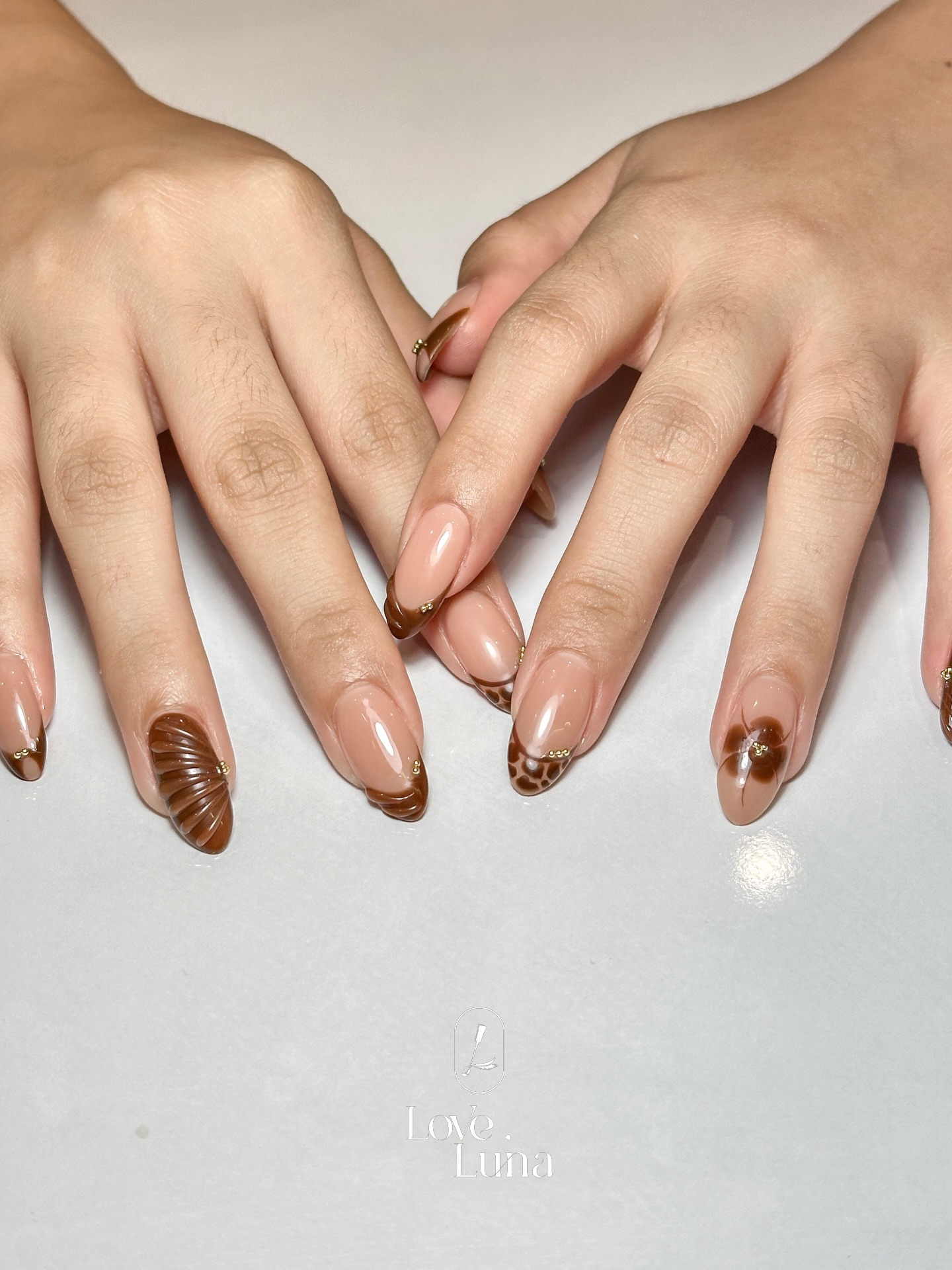 Soft gel extensions with brown French tips