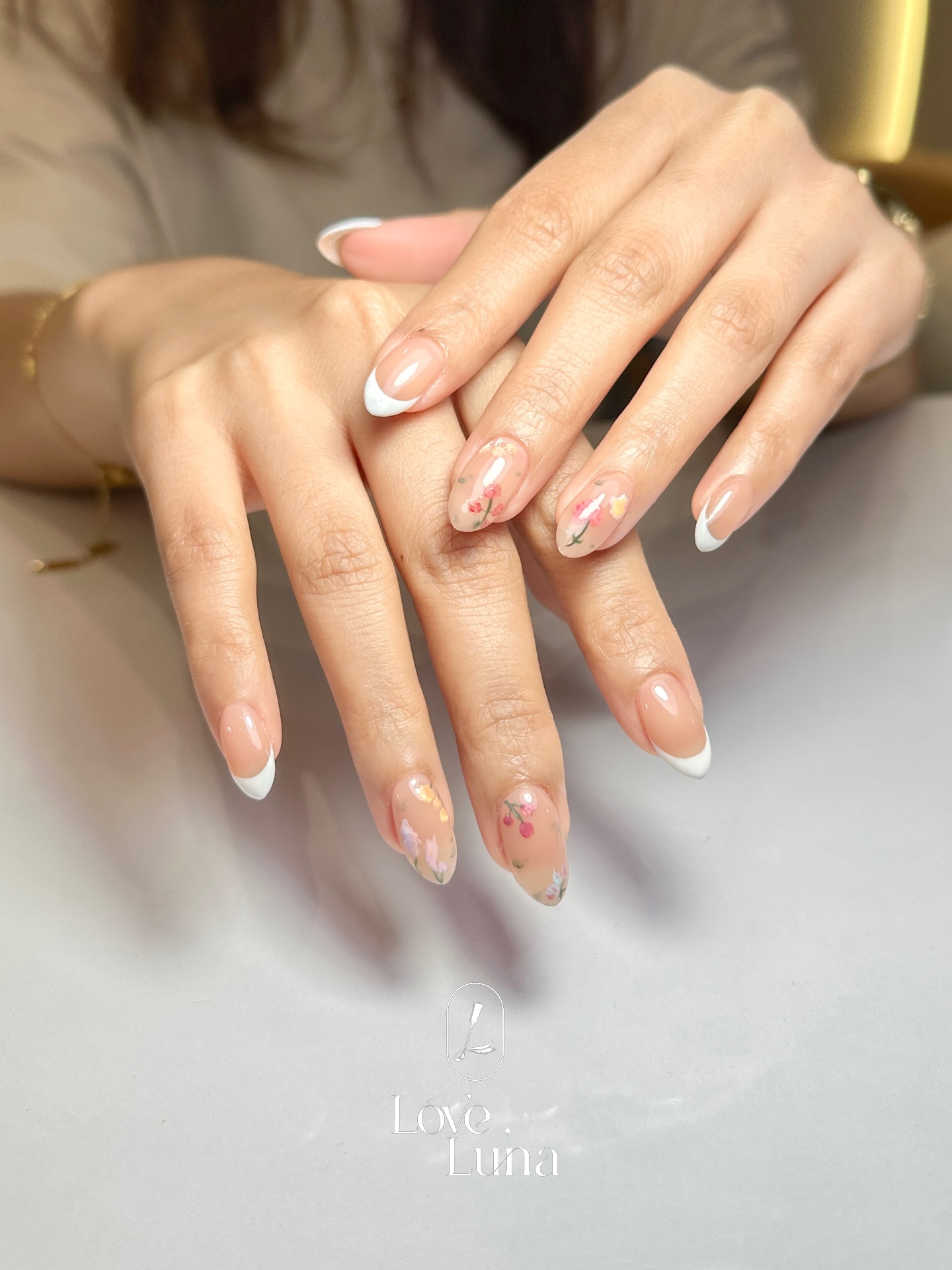 White French tips with delicate floral art