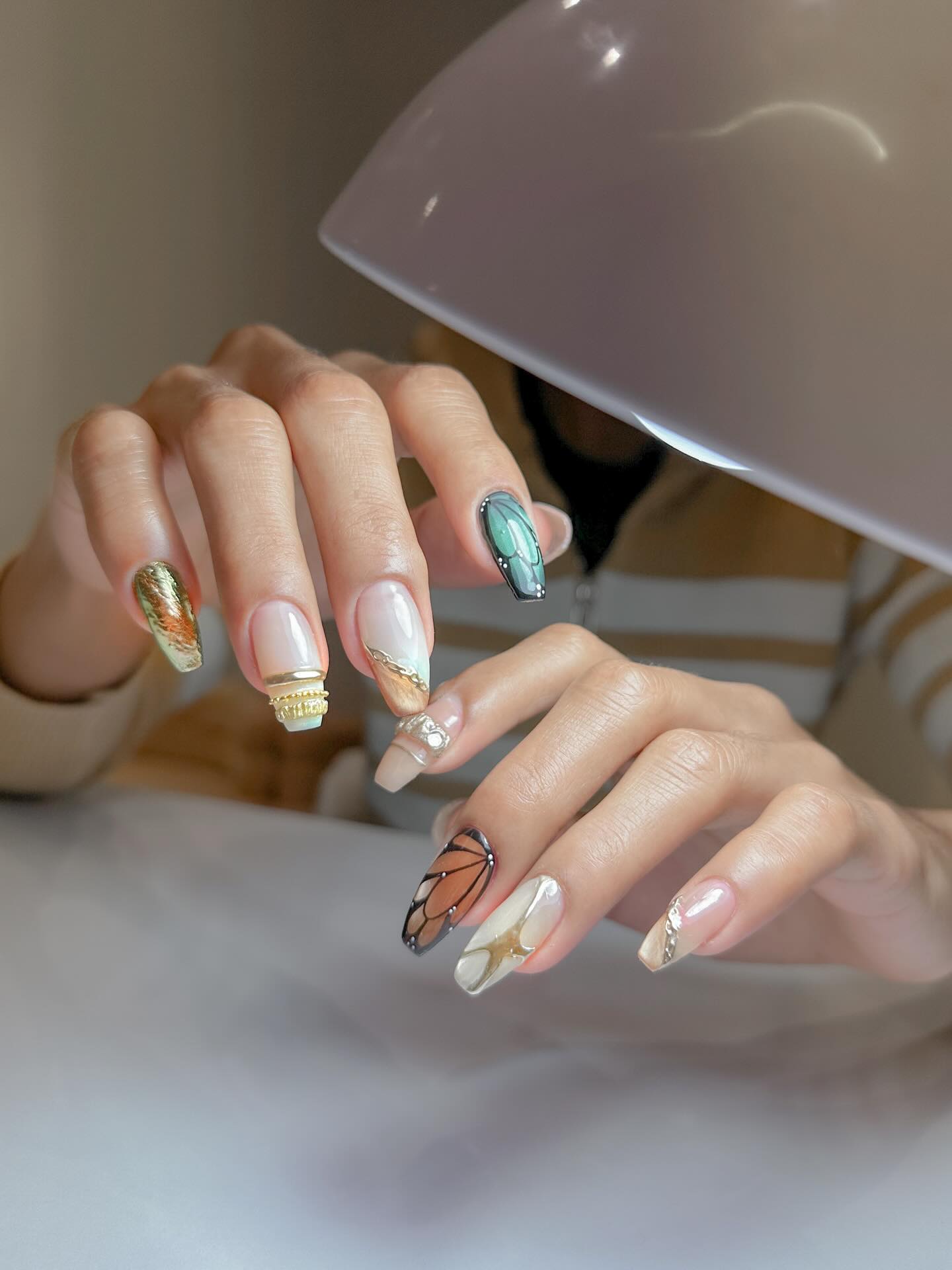 Butterfly and teal abstract nail art